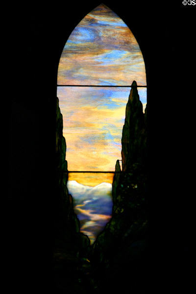 Stained glass windows with sky by Tiffany in Sage Chapel on Cornell Campus. Ithaca, NY.