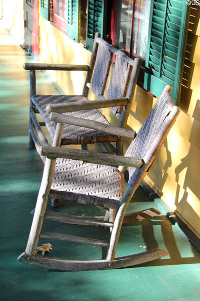 Woven wood strip chairs on verandah of Grant Cottage. Wilton, NY.