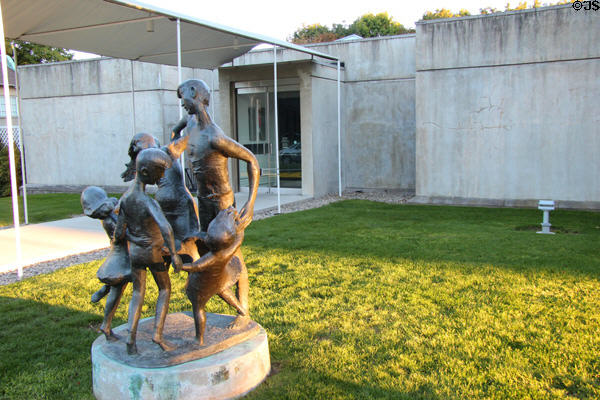 Main entrance for The Hyde Collection with Dancing Family sculpture by Milton Elting Hebald. Glens Falls, NY.