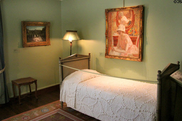Young Girl before a Mirror in a Pink Dress painting (1923) by Frederick C. Frieseke in green guest room at Hyde House. Glens Falls, NY.