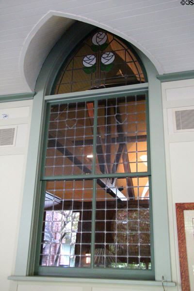 Gothic window of original print shop melded with later terrace roof at Roycroft Inn. East Aurora, NY.