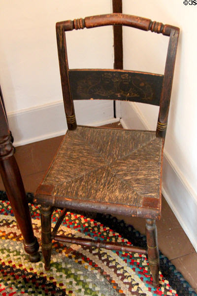 Unrestored Fillmore chair with cane seating at Millard Fillmore House. East Aurora, NY.
