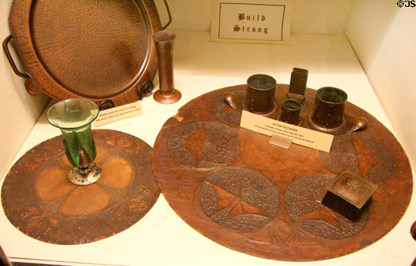 Copper, leather & glass objects by Roycroft at Elbert Hubbard Roycroft Museum. East Aurora, NY.