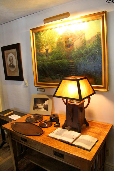 Roycroft Arts & Crafts copper & table lamp under Alexis Fournier painting at Elbert Hubbard Roycroft Museum. East Aurora, NY.