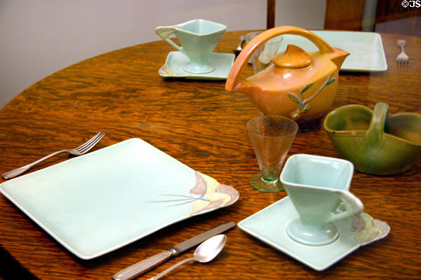 Arts & Crafts style dinner service on oak table at The Strong National Museum of Play. Rochester, NY.