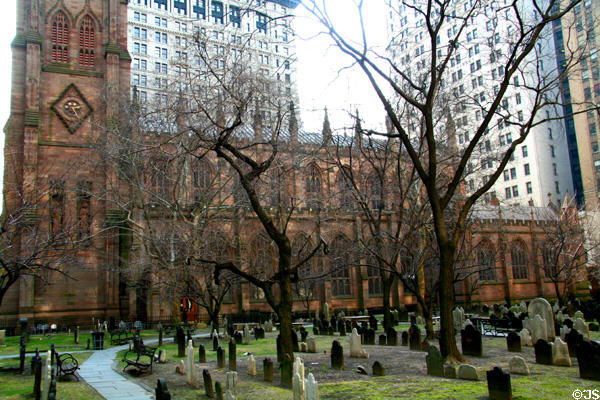 Gothic Revival features of Trinity Church over graveyard. New York, NY.