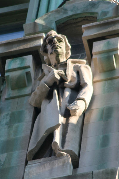Modern writer with quill sculpture on Old New York Evening Post Building. New York, NY.