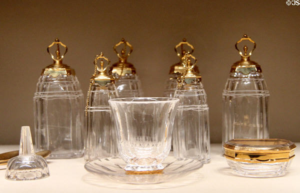 Rock crystal dressing table set with gold tops (1723) by Louis Mailly of France with additional vessels at Metropolitan Museum of Art. New York, NY.