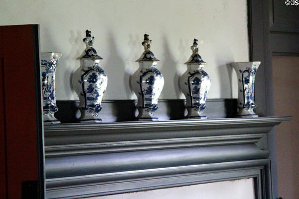 Delft porcelain on mantle of Schenck House parlor at Old Bethpage Village. Old Bethpage, NY.