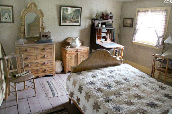 Bedroom in Layton Home at Old Bethpage Village. Old Bethpage, NY.