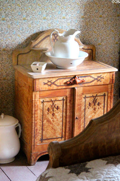 Bedroom washstand with basin & pitcher in Layton Home at Old Bethpage Village. Old Bethpage, NY.
