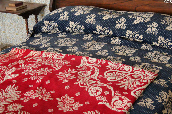 Master bedroom coverlets in Layton Home at Old Bethpage Village. Old Bethpage, NY.
