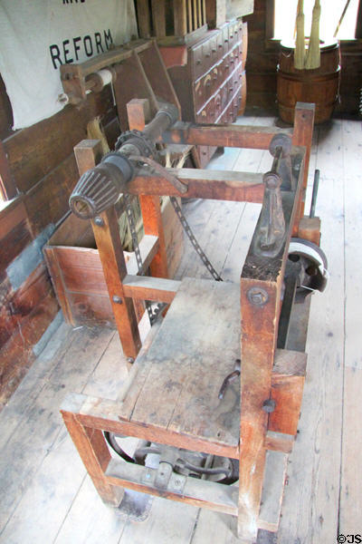 Broom making machine in Luyster Store at Old Bethpage Village. Old Bethpage, NY.