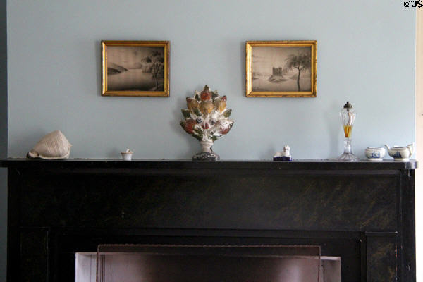 Parlor fireplace mantle bric-a-brac in Kirby House at Old Bethpage Village. Old Bethpage, NY.