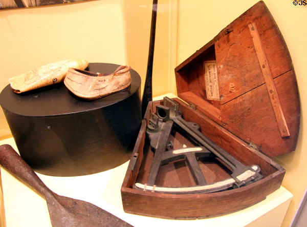Sextant in case from H. Duren Nautical Instruments plus other nautical objects at Whaling Museum. Cold Spring Harbor, NY.