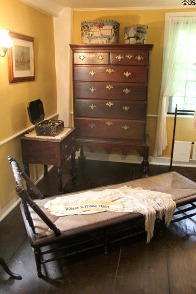 Antique chaise lounge draped with Woman Suffrage Party banner at Home Sweet Home Museum. East Hampton, NY.