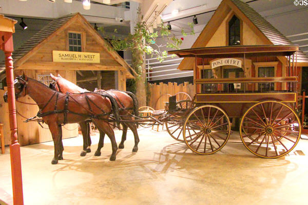 Village tableau with public conveyance at carriage collection of Long Island Museum. Stony Brook, NY.