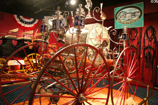 Details of parade hose carriage (1875) by Rumsey Manuf. Co. of Seneca Falls, NY at carriage collection of Long Island Museum. Stony Brook, NY.