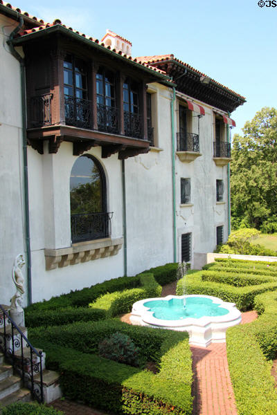 Formal garden under balcony facade at Vanderbilt Mansion. Centerport, NY.