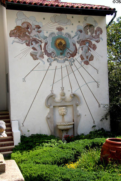 Wall sundial over garden at Vanderbilt Mansion. Centerport, NY.