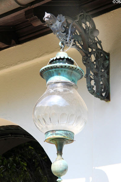 Hanging exterior lamp fixture with gargoyle at Vanderbilt Mansion. Centerport, NY.