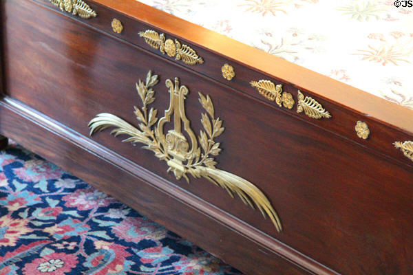 Footboard detail of replica of Napoleon's bed in Mr. Vanderbilt's bedroom at Vanderbilt Mansion. Centerport, NY.