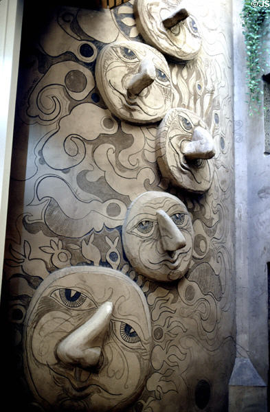 Amusing faces decorate lobby of Quaker Square Inn. Akron, OH.