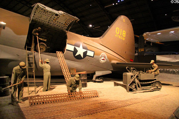 Cargo unloading from Curtiss C-46D Commando (1940) at National Museum of USAF. Dayton, OH.
