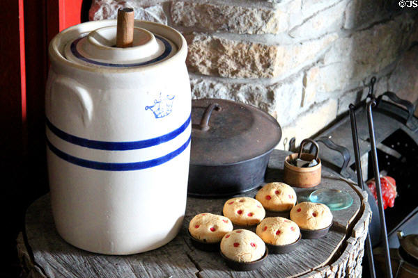 Crockery butter churn & muffin pan in kitchen at Johnston Farm. Piqua, OH.