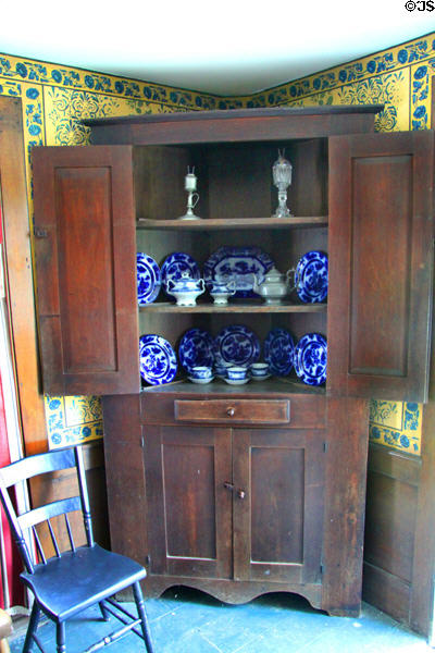 Corner cabinet with blue-flow porcelain in Clement Jagger House at to Hale Farm. Cleveland, OH.