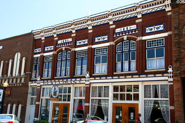 Highly decorated commercial building (1891) (111 W Harrison Ave.). Guthrie, OK.