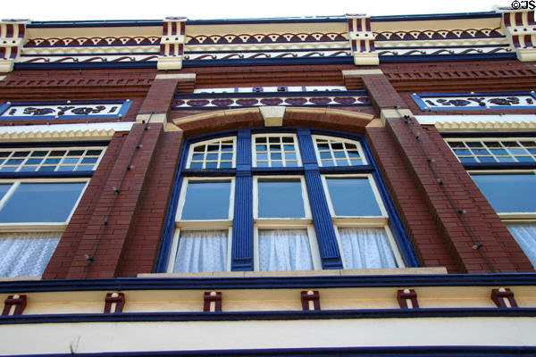 Window details of 1891 commercial building at 111 W Harrison Ave. Guthrie, OK.