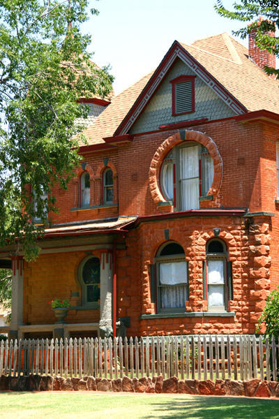 Heritage house with horseshoe-shaped windows. Guthrie, OK.
