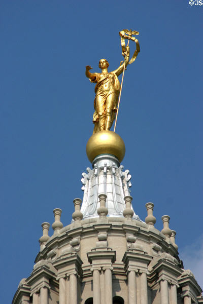 Gold figure atop dome of Pennsylvania Capitol. Harrisburg, PA.