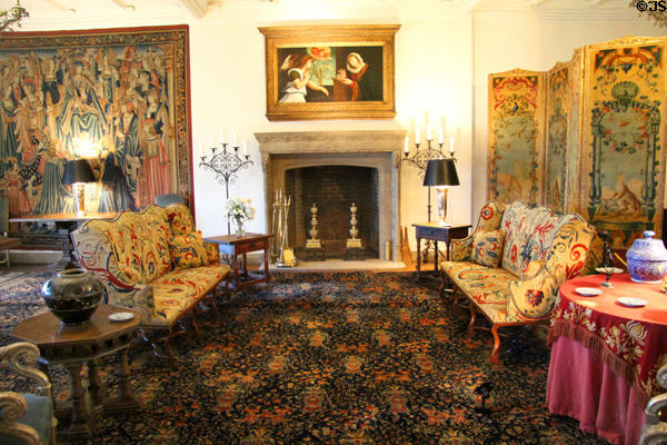 Dining room fireplace & sitting area with French Regency furniture at Rough Point. Newport, RI.