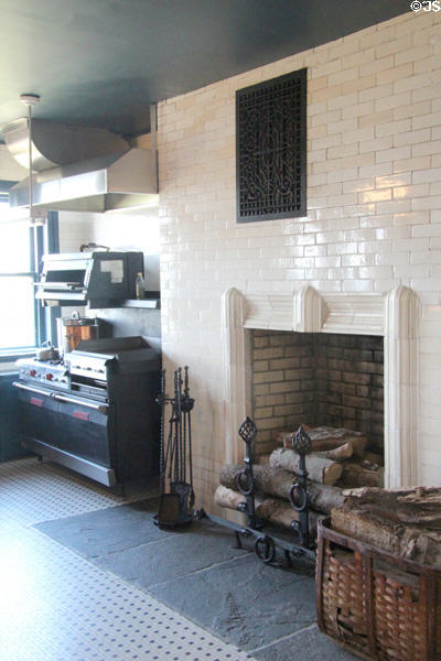 Range & fireplace in kitchen at Rough Point. Newport, RI.