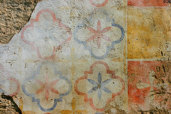 Mission San José remaining piece of original painted plaster exterior. San Antonio, TX.