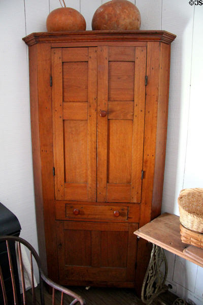 Corner cupboard at Nichols-Rice-Cherry House at Sam Houston Park. Houston, TX.