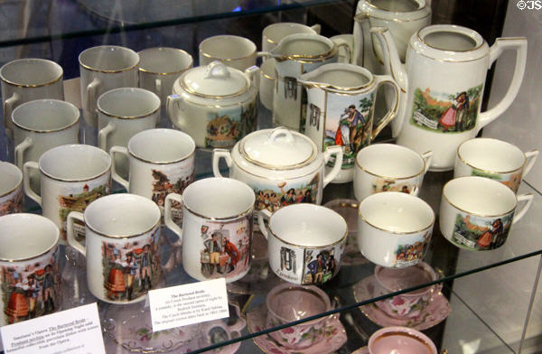 Porcelain cups & teapots with painted scenes from The Bartered Bride opera by Bedrich Smetana at Czech Cultural Center. Houston, TX.