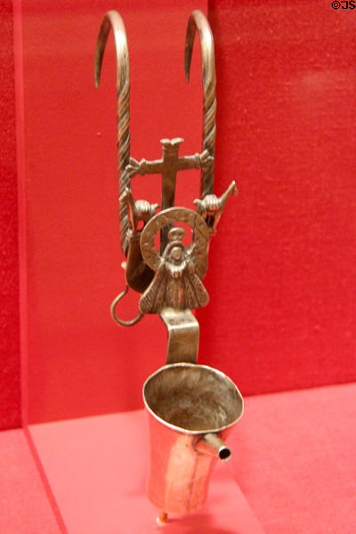 Silver miner's lamp with Virgin Mary (19thC) from Bolivia at San Antonio Museum of Art. San Antonio, TX.