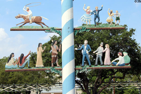 Scenes of western culture & peace treaty on Fredericksburg Maypole. Fredericksburg, TX.