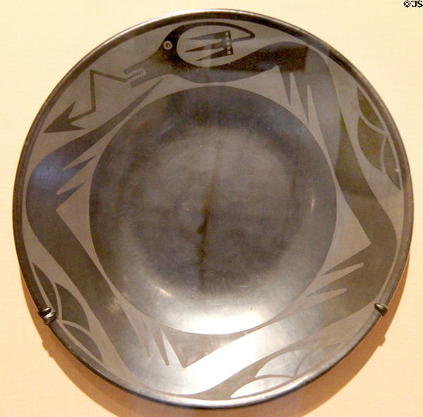 Ceramic black-on-black plate with water serpent (1943-56) by Maria Martinez & Santana Martinez of San Ildefonso Pueblo, NM at Dallas Museum of Art. Dallas, TX.