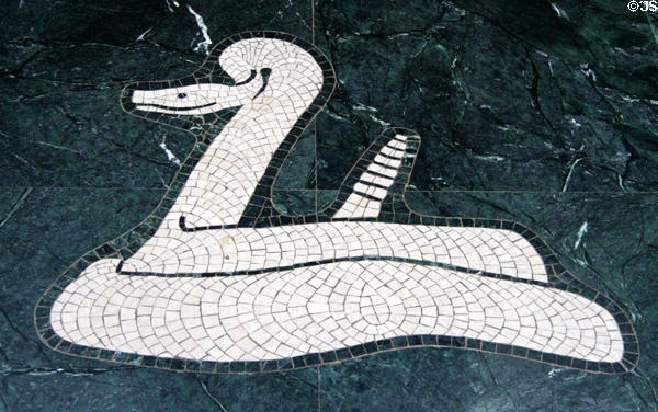 Western Diamondback Rattlesnake limestone floor mosaic detail in Great Hall of State at Fair Park. Dallas, TX.