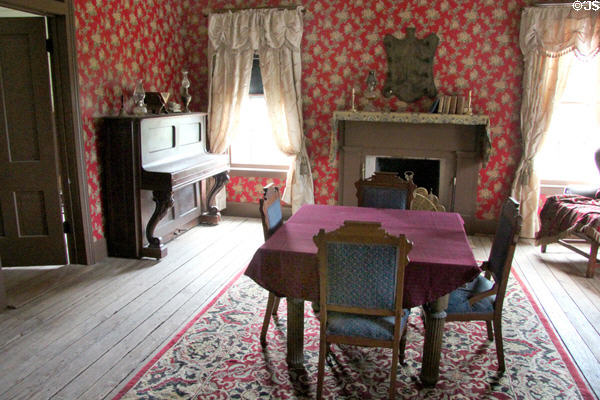 Gentleman's parlor furnished to 1880s in Bell House at Pioneer Farms. Austin, TX.