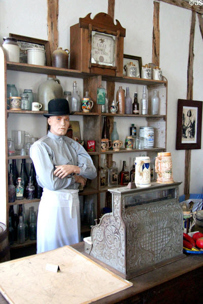 Cash register, beer steins & bottles inside Star Exchange at Conservation Plaza. New Braunfels, TX.