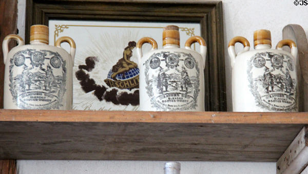 Scotch whiskey jugs inside Star Exchange at Conservation Plaza. New Braunfels, TX.