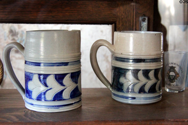 Salt glaze stoneware beer steins inside Star Exchange at Conservation Plaza. New Braunfels, TX.