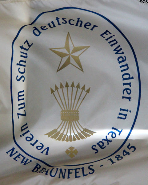 Banner for the Society for the Protection of German Immigrants in Texas (founded in 1845) at Conservation Plaza. New Braunfels, TX.