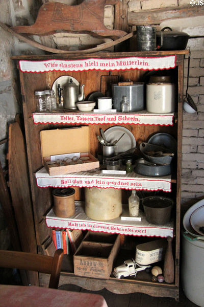 Cabinet shelves with embroidered German sayings in Locksted-Seibold house at Conservation Plaza. New Braunfels, TX.