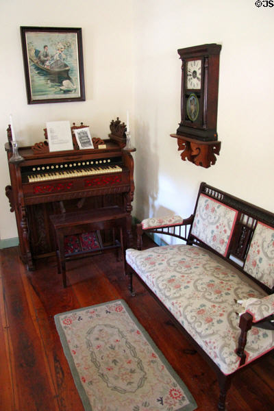 Parlor with organ in Jahn House at Conservation Plaza. New Braunfels, TX.